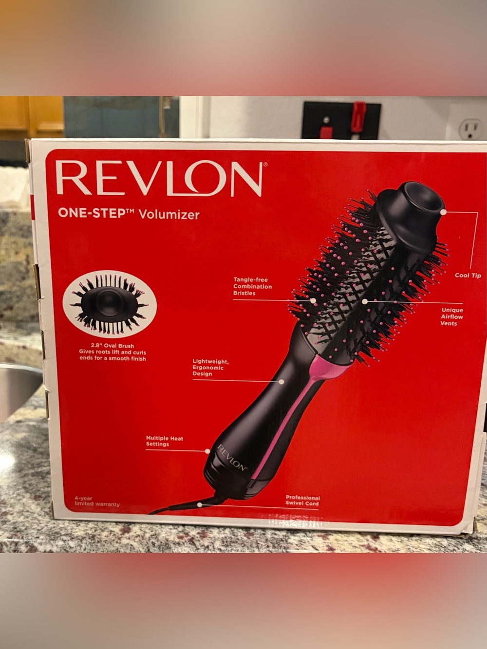 Revlon One-Step Volumizer Hot Air Brush in Black and Pink